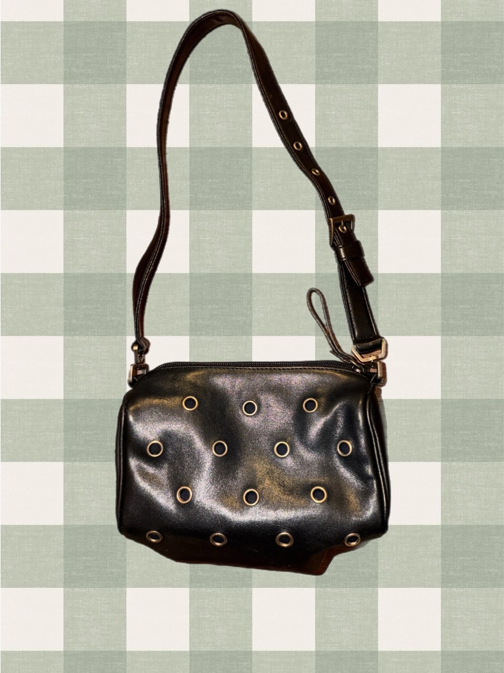 Black Leather Shoulder Bag with Silver Eyelet Accents
